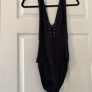 Open back halter body suit